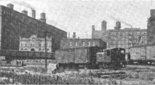 photograph of train in rail yard