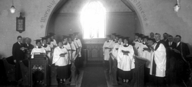 Church choir singing in front of church window, ca. 1918.