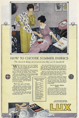 1919 Lux soap ad, How to Choose Summer Fabrics, woman looking at fabric.