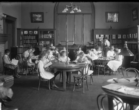 Children reading in library, ca. 1910, William Davis Hassler.