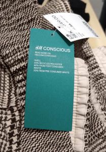 H&M label for pants made of recycled household waste.