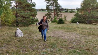 Mary Grace McGeehan walking at Gamla Uppsala, Sweden, 1916.