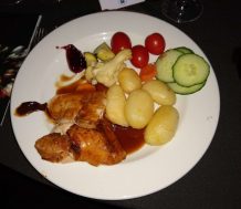 plate of food, turkey and potatoes and cranberry sauce