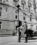 Photograph of policeman at call box, Washington, D.C., 1910s.