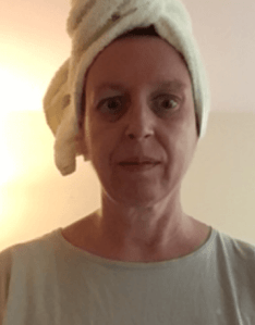 Mary Grace McGeehan, head in towel, May 2020.