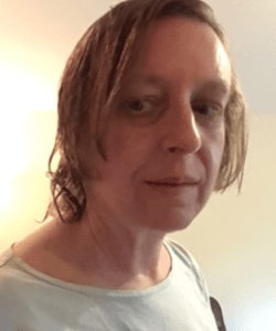 Mary Grace McGeehan halfway through haircut, May 1920.