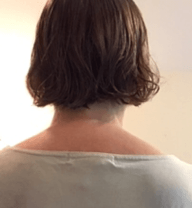 Mary Grace McGeehan haircut from back, May 1920.