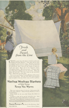 Nashua Wood Blankets ad, maid hanging blankets on line while children fold, Ladies' Home Journal, 1920.