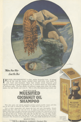 Mulsfield Cocoanut Oil Shampoo ad, woman with long hair looking at reflection in ocean, Ladies' Home Journal, 1920.